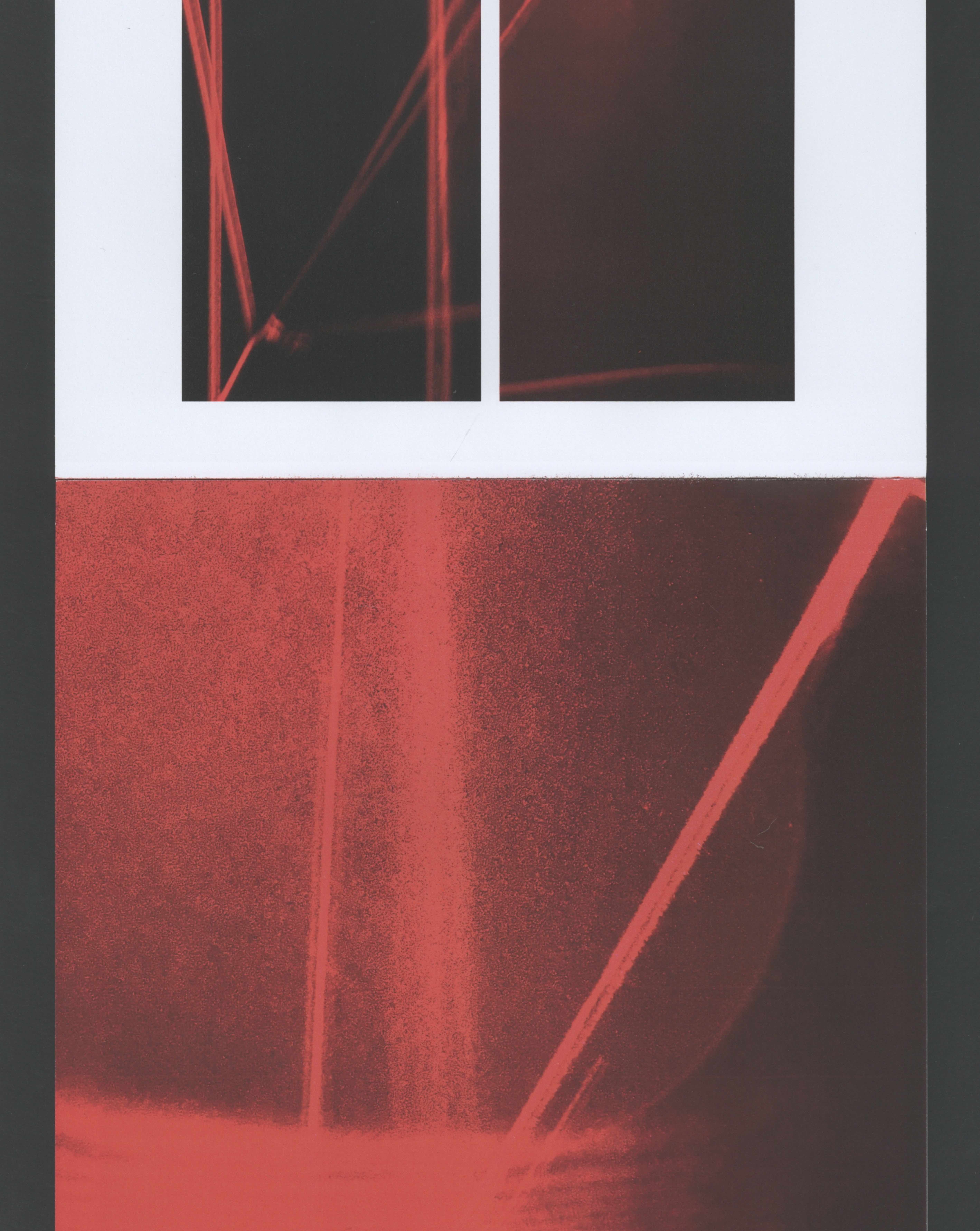 Composite of red laser light streaks and dark photographic prints